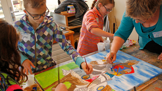 Image of children painting a picture